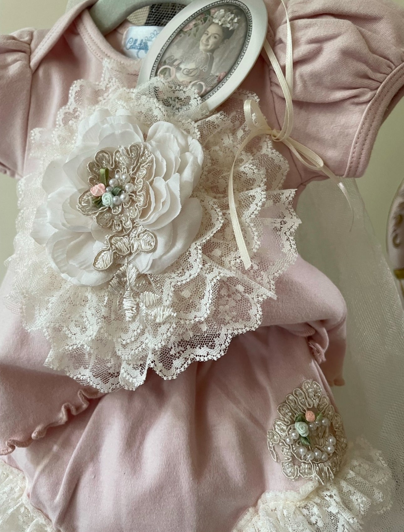 French Pink Two-Piece Top & Shorts adorned with intricate lace medallion design