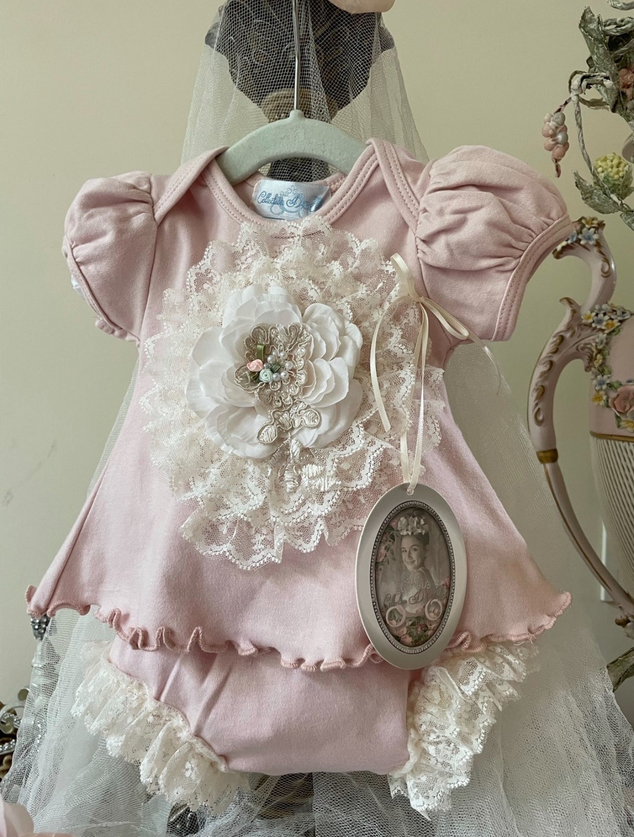 French Pink Two-Piece Top & Shorts adorned with intricate lace medallion design
