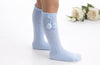 Baby Blue Knee-High Socks with Pom Pom Detail | Classic Unisex Children’s Socks