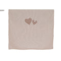 Beige towel with embroidered hearts on a pink  background