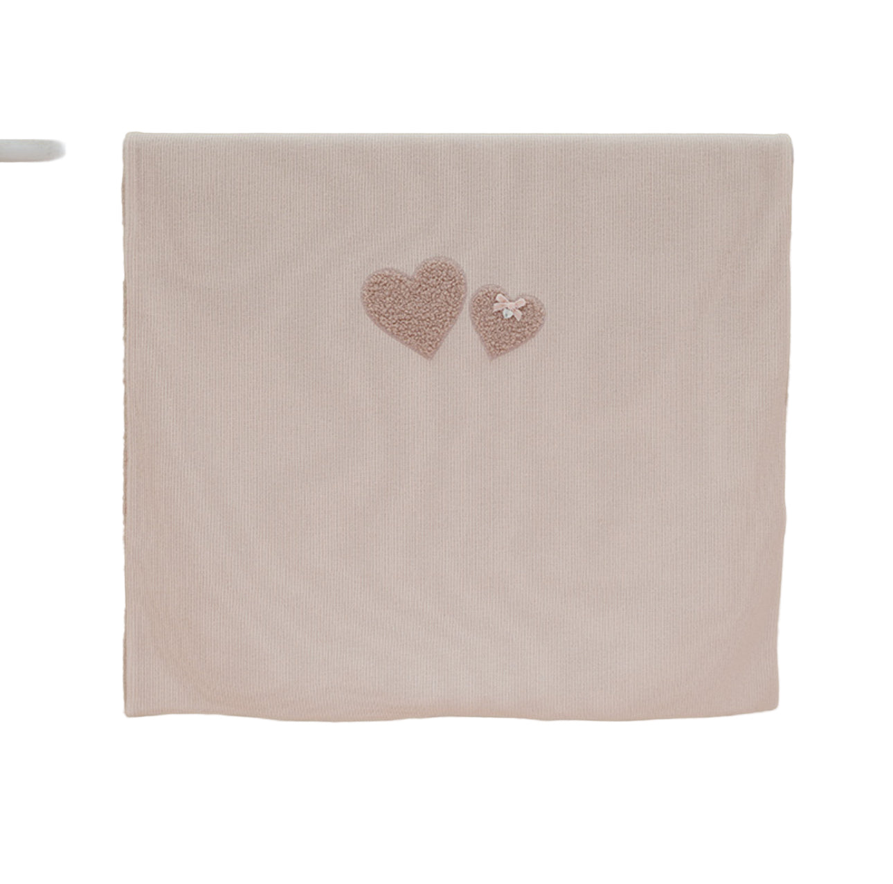 Beige towel with embroidered hearts on a pink  background