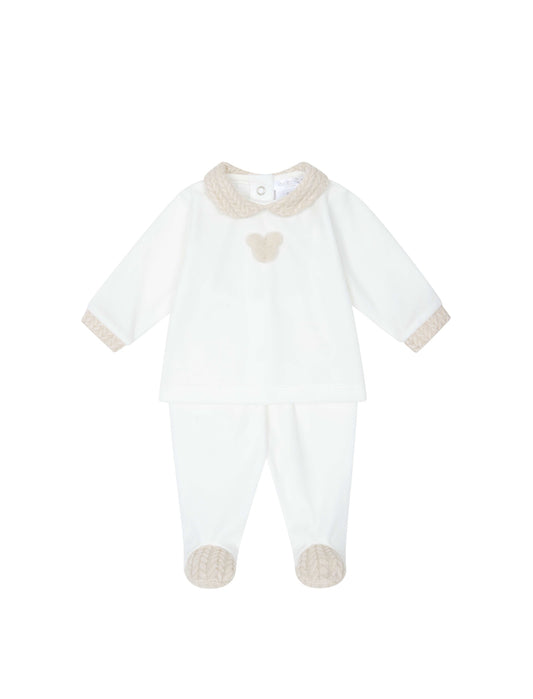 White baby onesie with beige accents on a white background