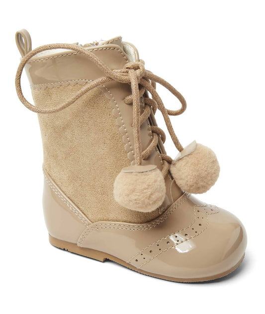 Girls hard sole boots with pom pom laces